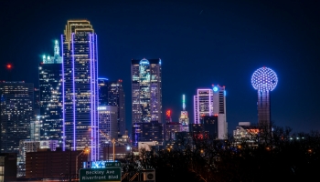 Dallas skyline with Reunion Tower in lights.