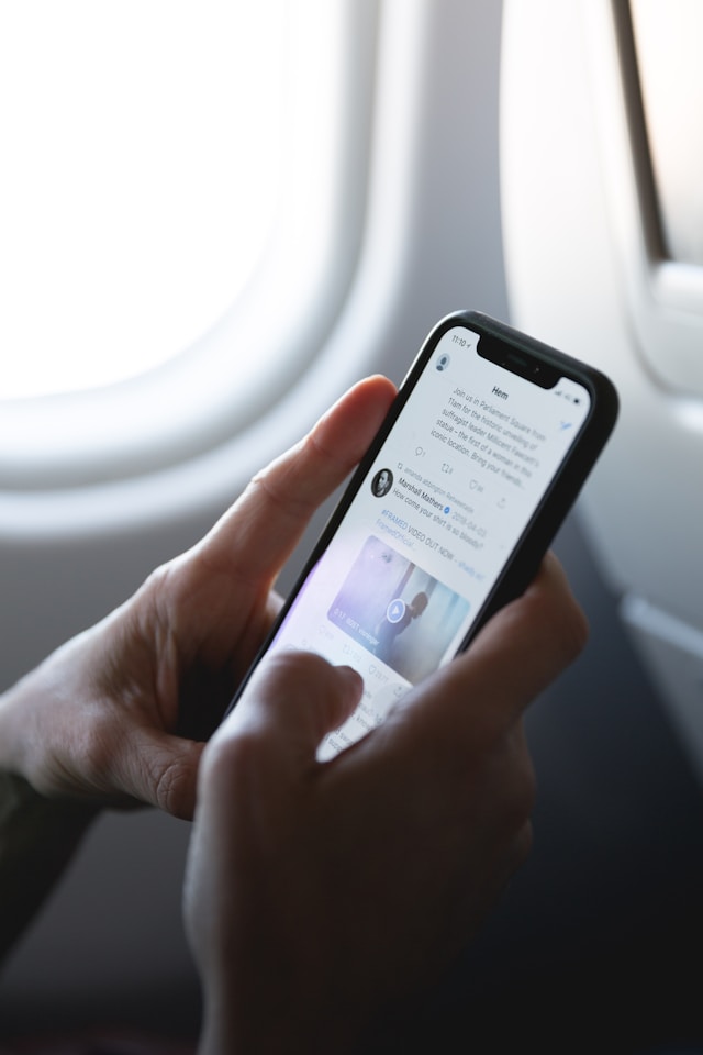 social media user on airplane